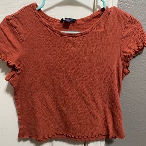 Orange/red ruffle american eagle shirt